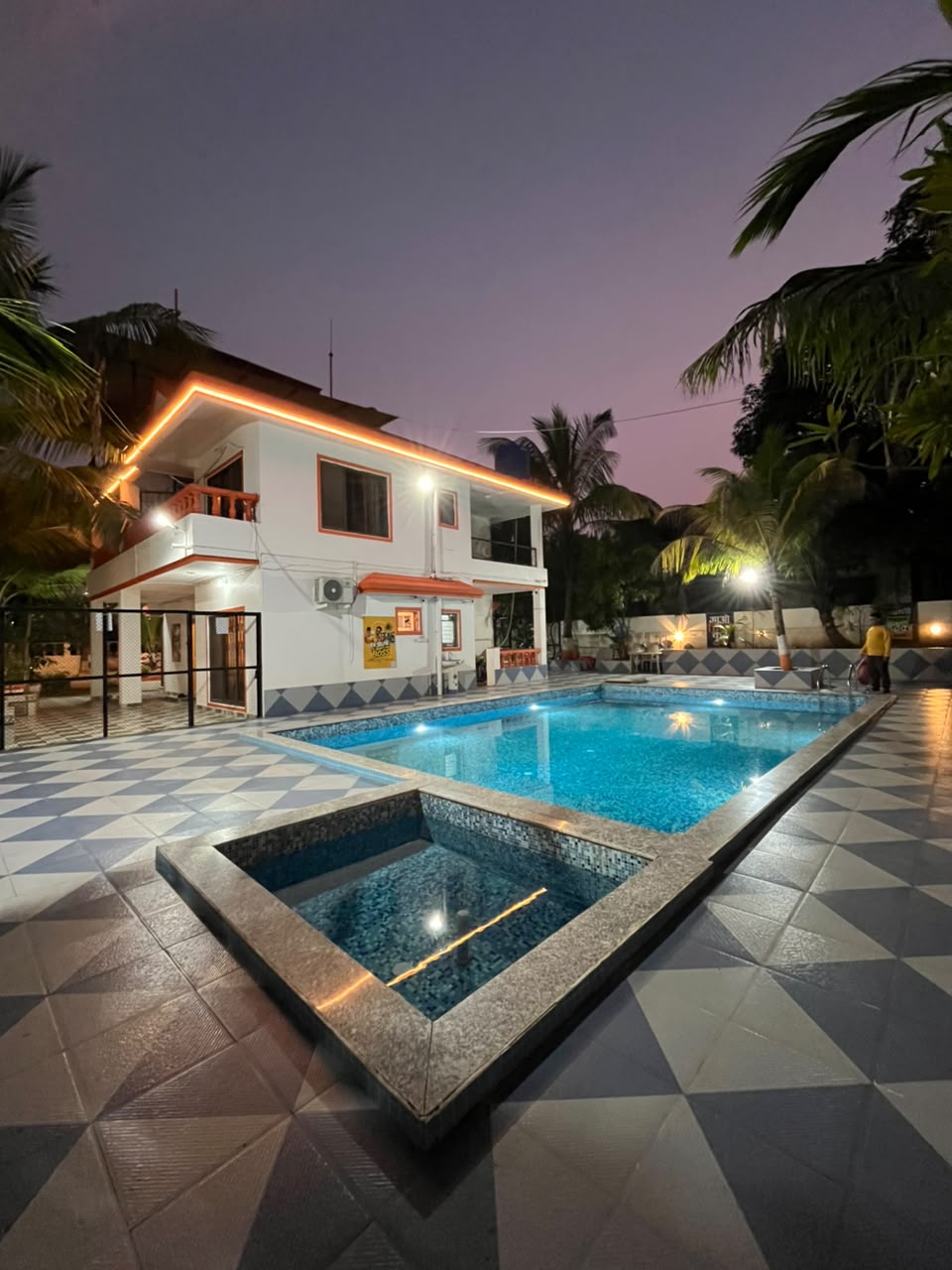 Chill Out Villa beside its private pool at dusk